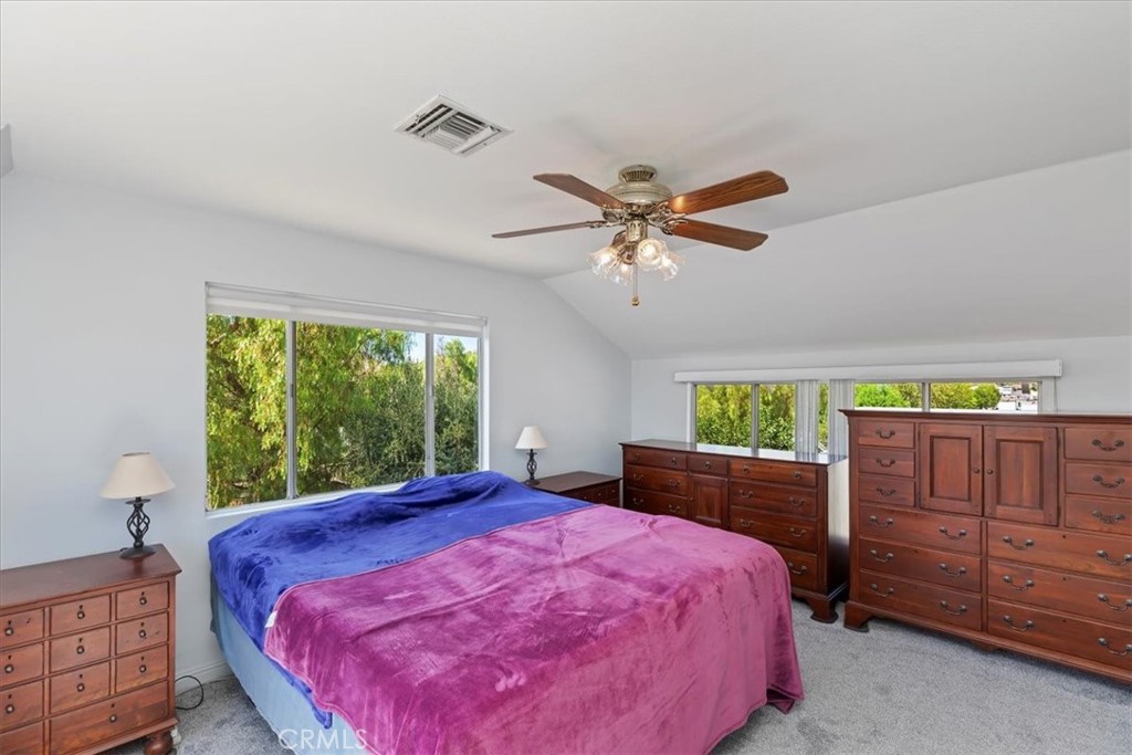 10555 Robinson Avenue Riverside, CA 92505 - Photo 46 of 65 a bed sitting in a bedroom next to a window