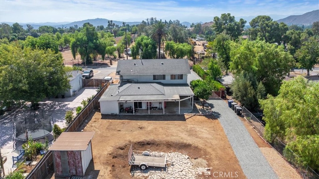 10555 Robinson Avenue Riverside, CA 92505 - Photo 8 of 65 an aerial view of a house with a yard basket ball court and outdoor seating