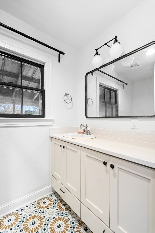 517 North Ave F Elgin, TX 78621 - Photo 16 of 21 a bathroom with a sink and a mirror