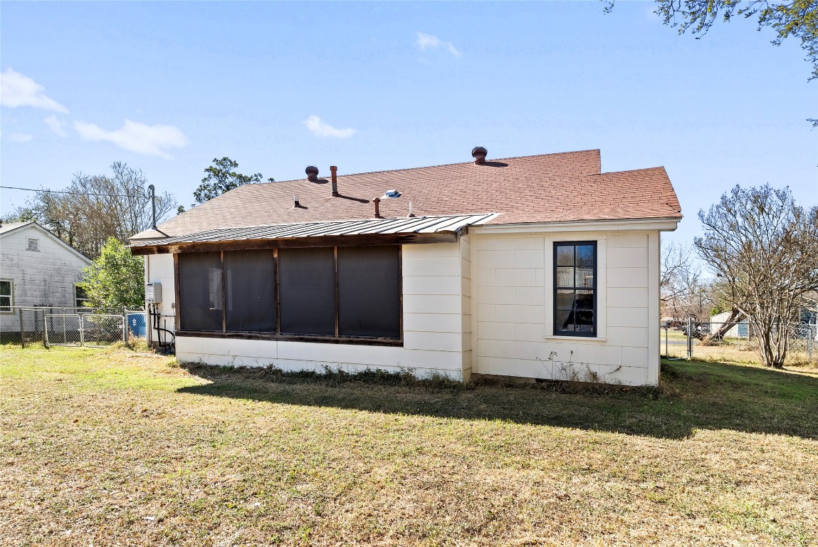 517 North Ave F Elgin, TX 78621 - Photo 20 of 21 a front view of a house with a yard