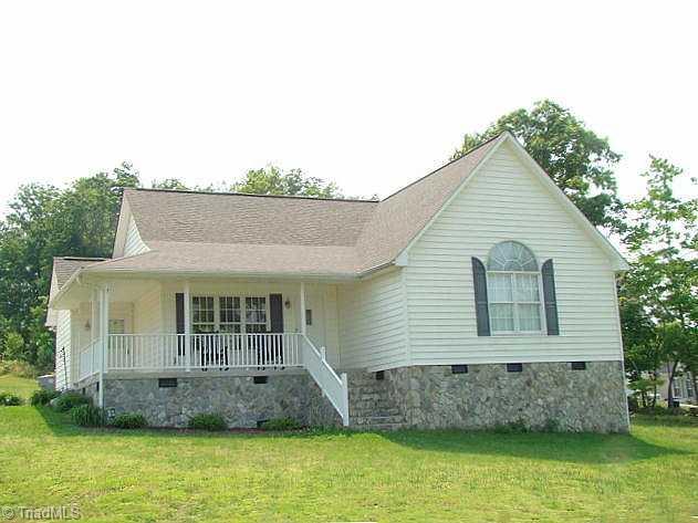 2591 Peppertree Ridge Road Randleman, NC 27317 - Photo 1 of 16 Exterior Front. Rock fondation with wrap around front porch.