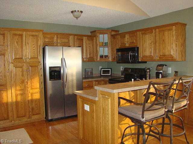 2591 Peppertree Ridge Road Randleman, NC 27317 - Photo 5 of 16 Kitchen. Eat-at bar