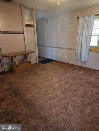 a view of a livingroom with a flat screen tv