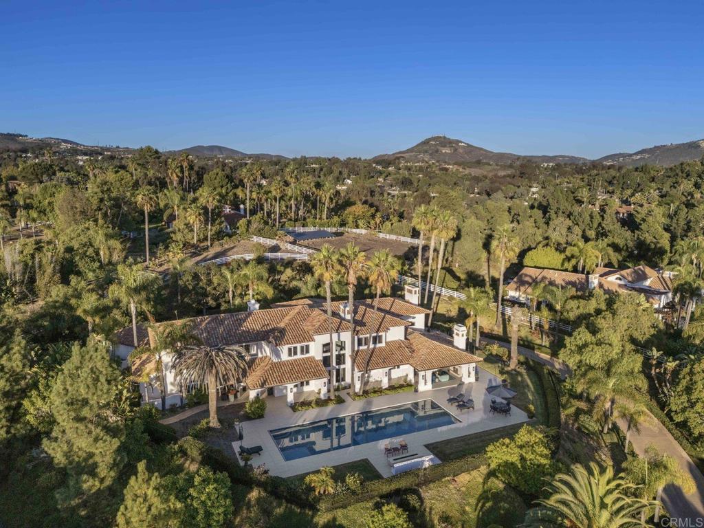 a view of a city with mountains in the background