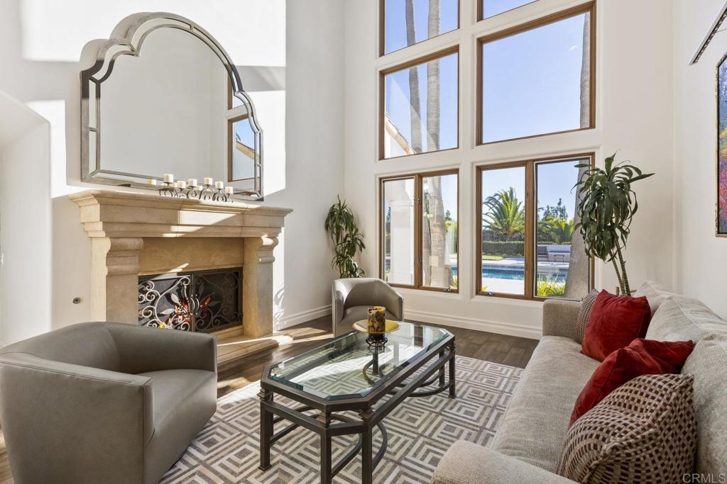 3226 Violet Ridge Encinitas, CA 92024 - Photo 11 of 54 a living room with furniture and a fireplace