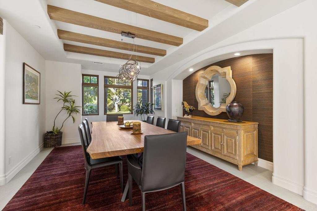 3226 Violet Ridge Encinitas, CA 92024 - Photo 13 of 54 a view of a dining room with furniture window and wooden floor