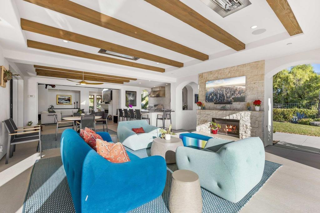 3226 Violet Ridge Encinitas, CA 92024 - Photo 23 of 54 a living room with furniture and a large window