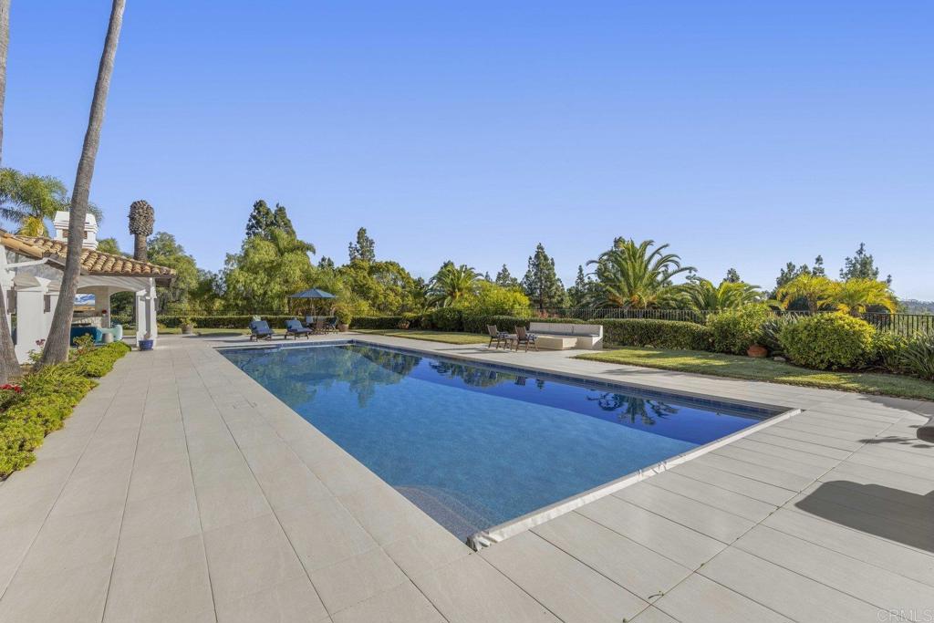 3226 Violet Ridge Encinitas, CA 92024 - Photo 27 of 54 a view of swimming pool with outdoor seating and plants