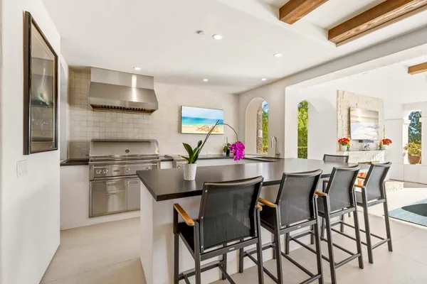 a kitchen with appliances cabinets and a window