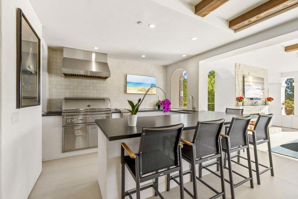3226 Violet Ridge Encinitas, CA 92024 - Photo 30 of 54 a view of a dining room with furniture