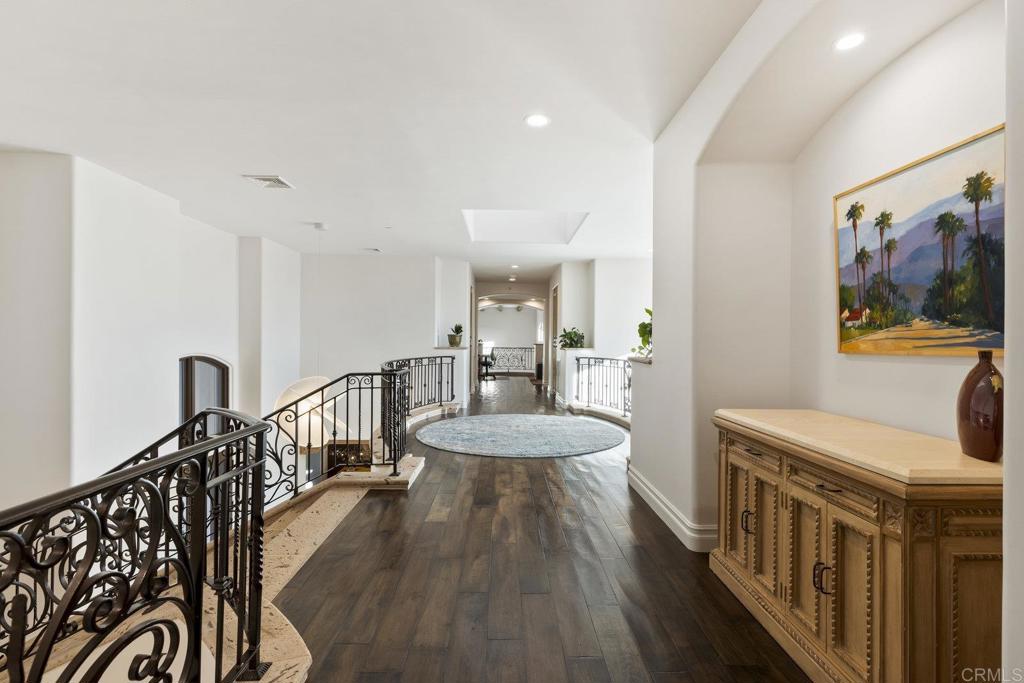 3226 Violet Ridge Encinitas, CA 92024 - Photo 38 of 54 a living room with furniture and a wooden floor