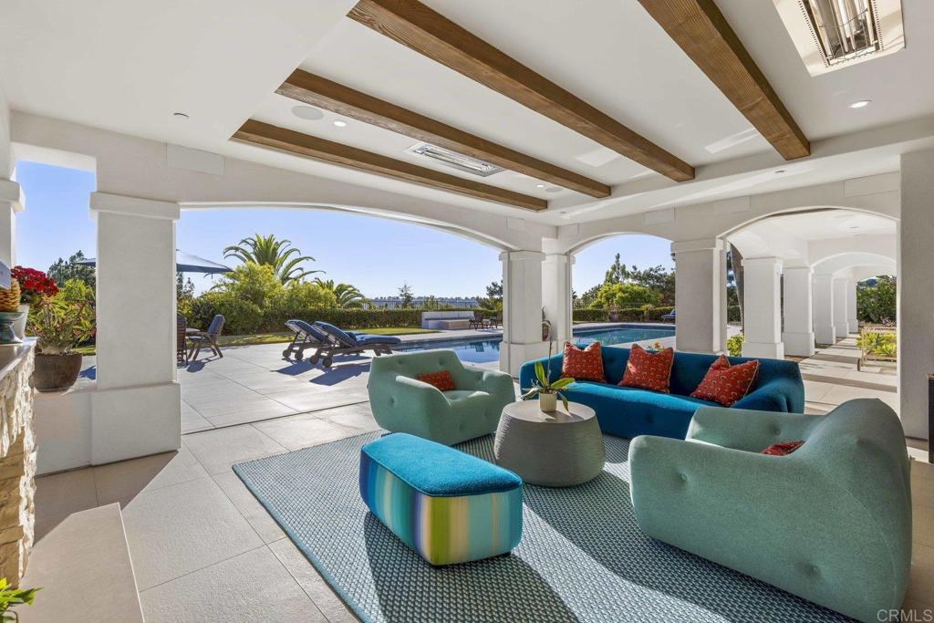 3226 Violet Ridge Encinitas, CA 92024 - Photo 4 of 54 a living room with furniture and a large window