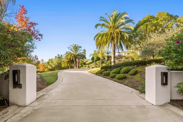 front view of a house with a garden