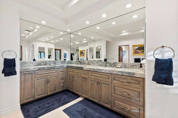 a bathroom with a bathtub and shower