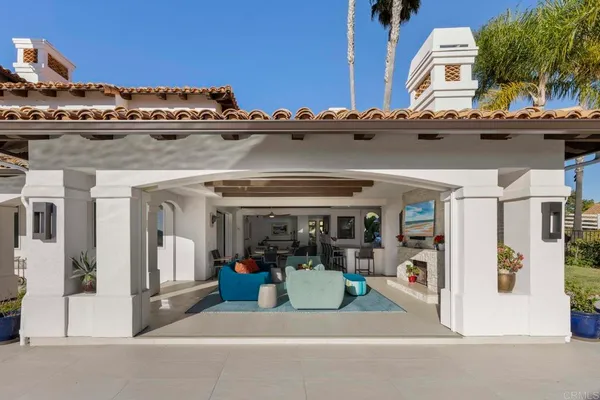 a kitchen with a table and chairs in it