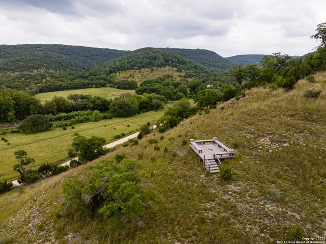 an aerial view of residential house with outdoor space