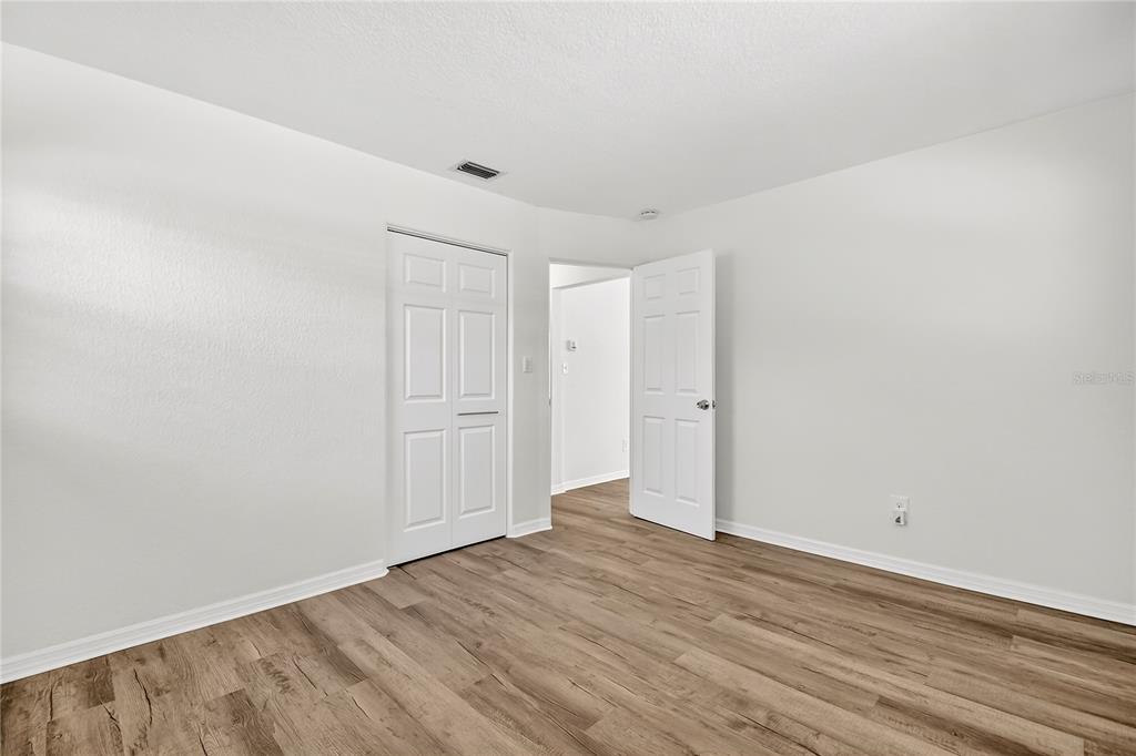13440 1st Street East Madeira Beach, FL 33708 - Photo 36 of 44 a view of an empty room
