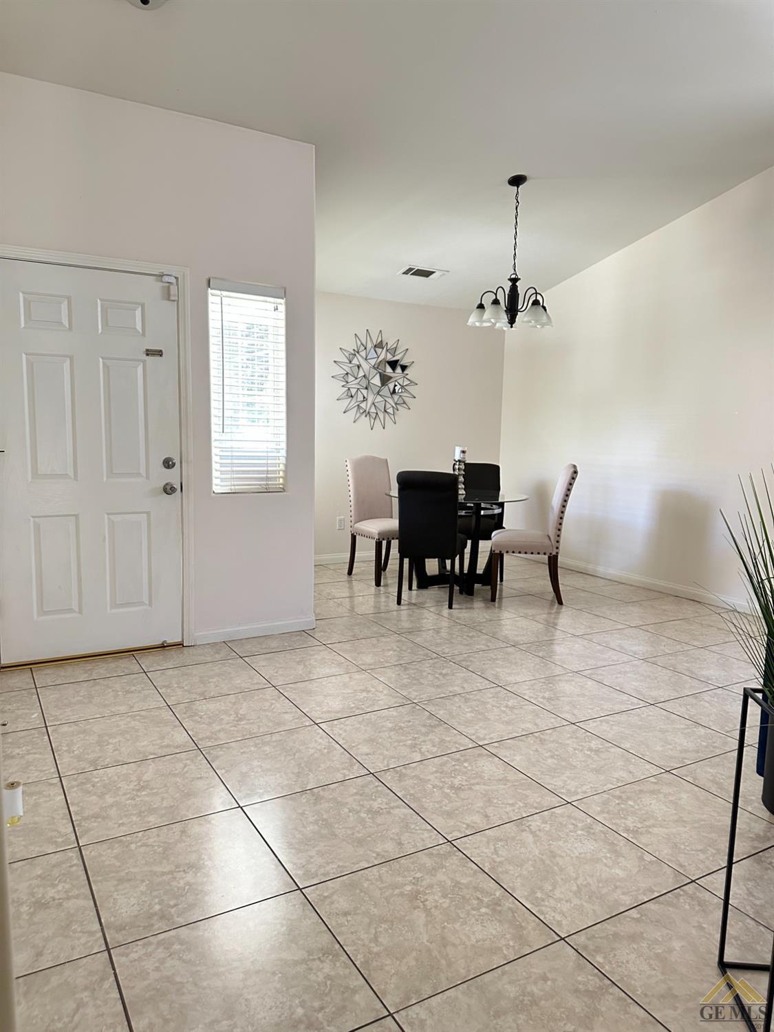 Undisclosed Address Bakersfield, CA 93313 - Photo 4 of 7 a view of a livingroom with furniture
