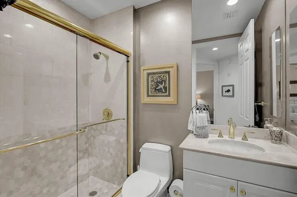 a front view of a residential apartment building with a yard