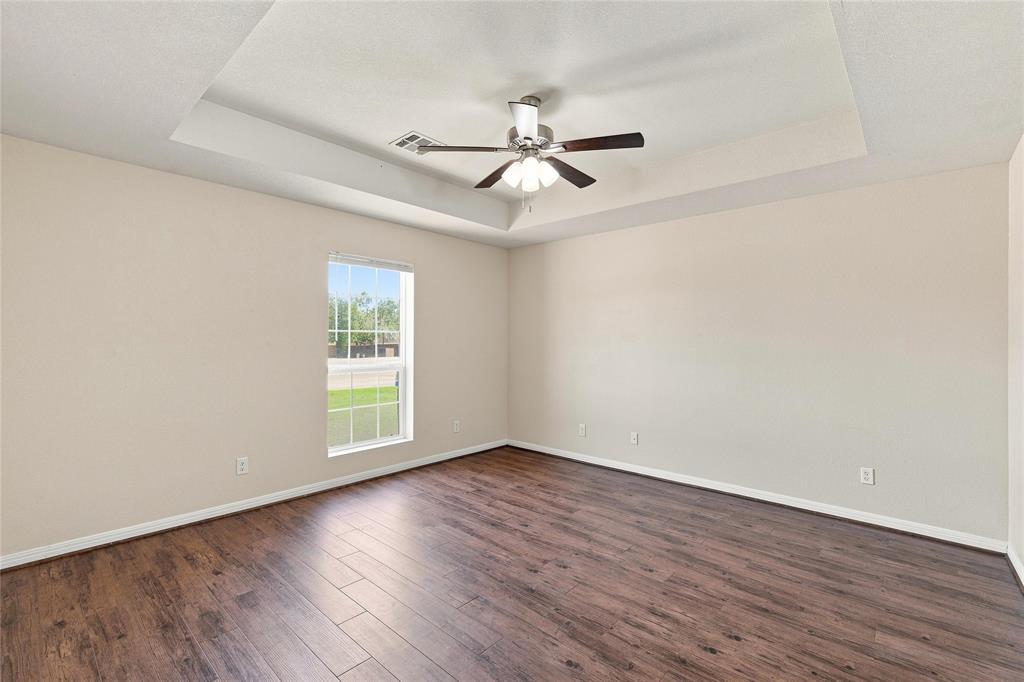 204 Raven Ridge Court Waco, TX 76705 - Photo 13 of 19 Recessed ceiling detail with a flush-mount ceiling fan