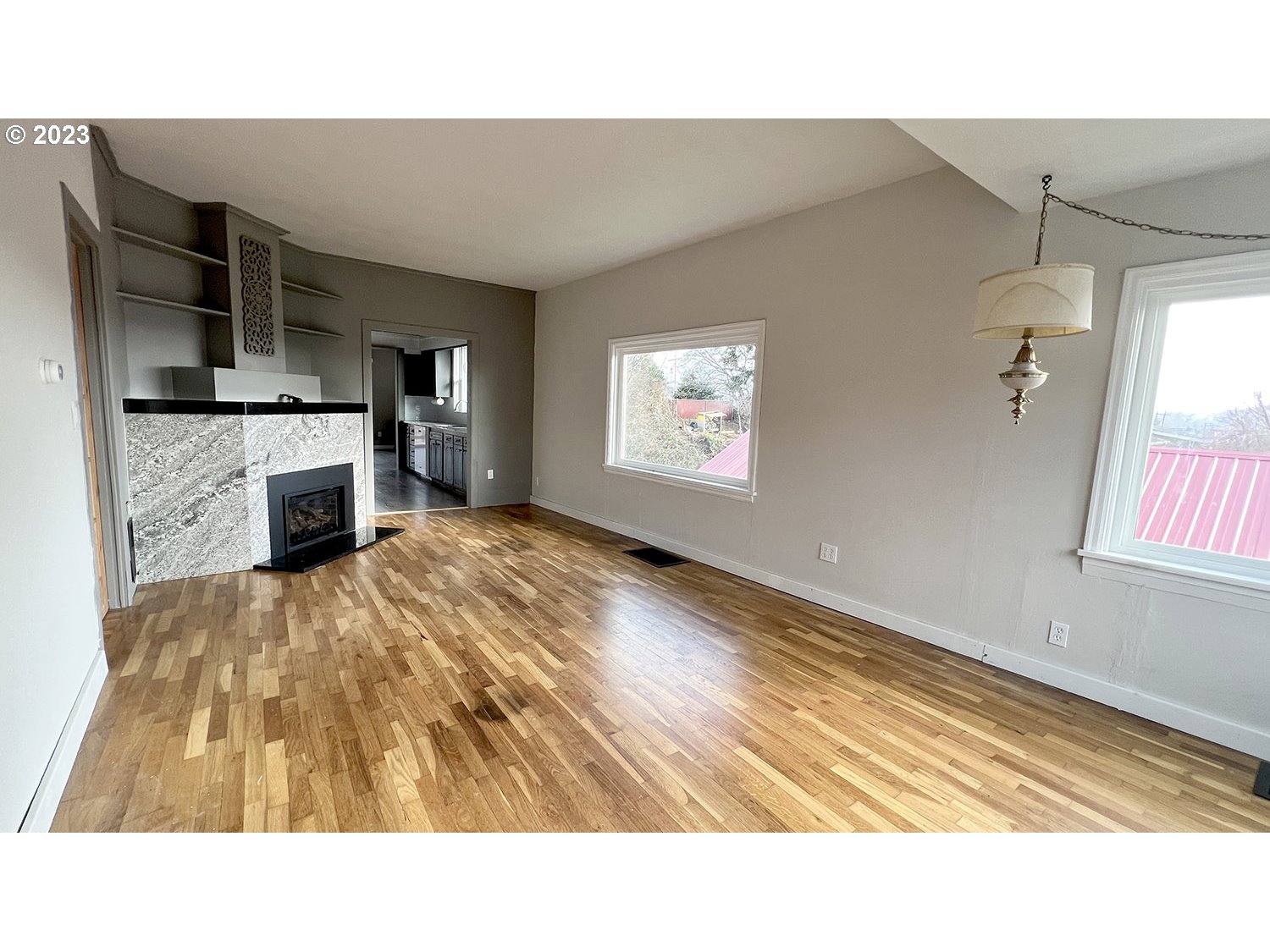 1832 4th Street Astoria, OR 97103 - Photo 2 of 4 a open kitchen with sink and cabinets