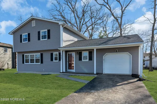 a front view of house with yard