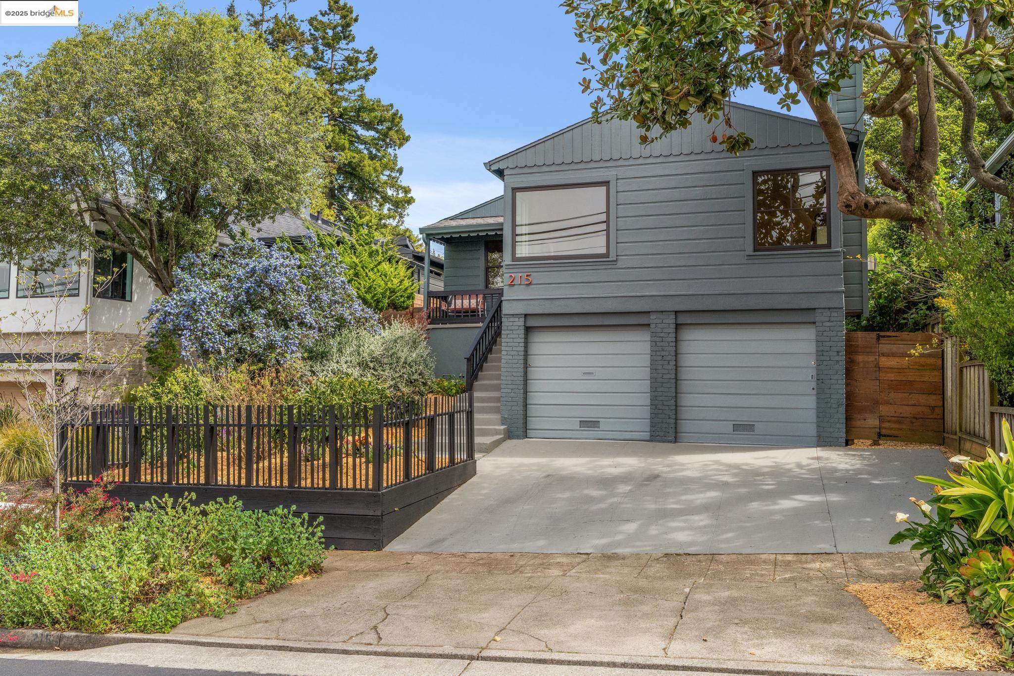 a front view of a house with a garage