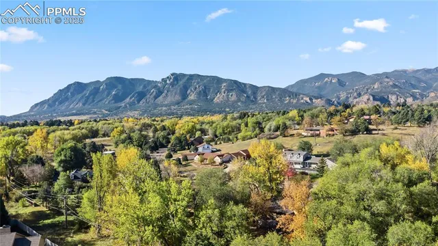 a view of residential house and mountain view