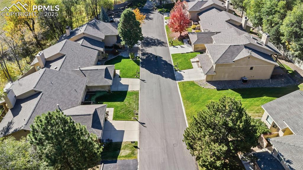 2135 Glenhill Road Colorado Springs, CO 80906 - Photo 50 of 50 an aerial view of a house with a garden and plants