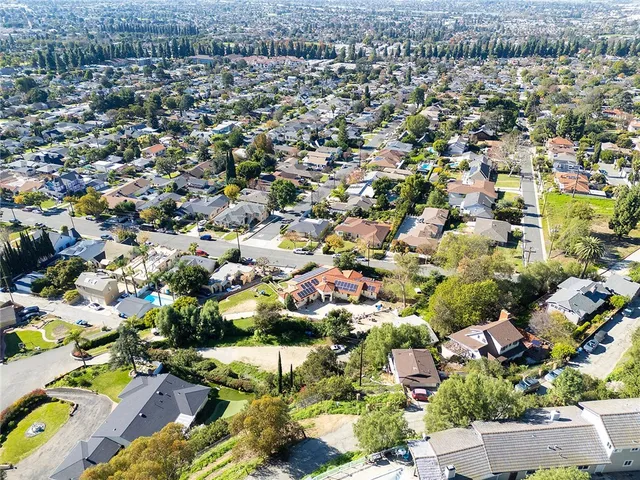 an aerial view of a city with lots of residential buildings