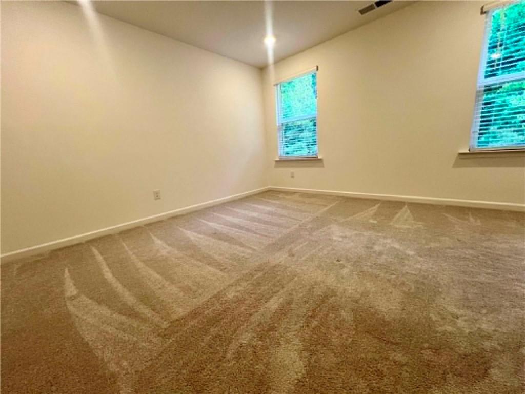 683 Evergreen Road Winder, GA 30680 - Photo 30 of 37 a view of an empty room with a window