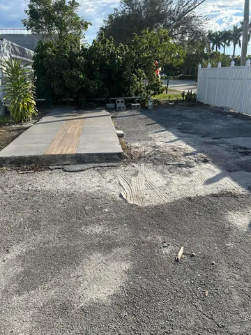 a view of outdoor space with deck and yard