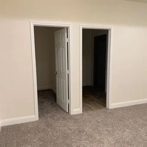 an empty room with closet