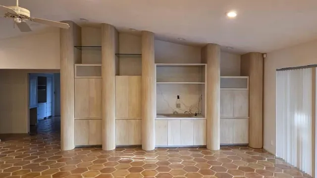 a kitchen with granite countertop a stove microwave and cabinets