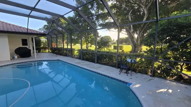 a bedroom with a bed and a mirror