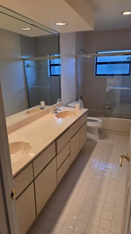 20167 Back 9 Drive Boca Raton, FL 33498 - Photo 26 of 28 a bedroom with a bed and a mirror