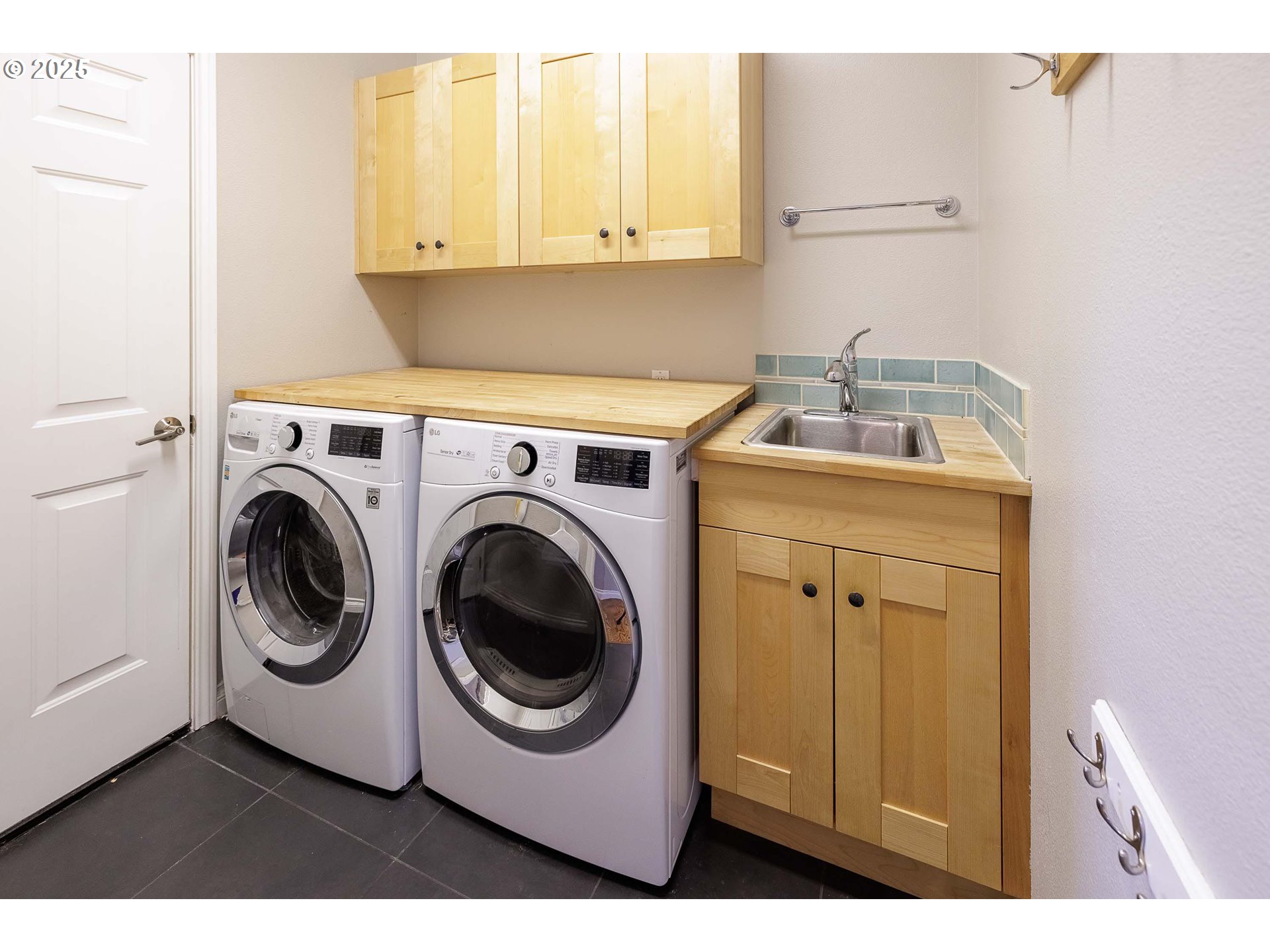 6424 Southwest Flower Street Portland, OR 97221 - Photo 21 of 29 a utility room with dryer and washer
