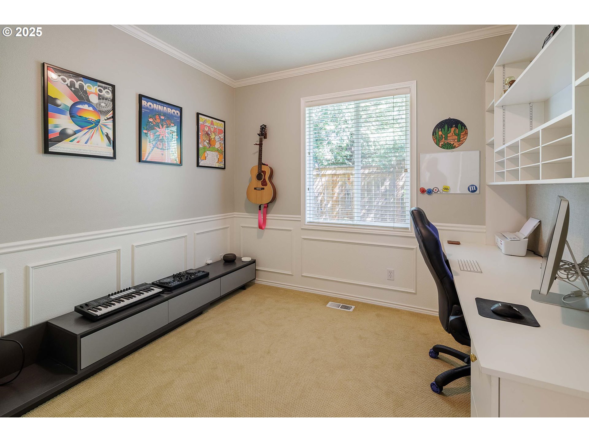 6424 Southwest Flower Street Portland, OR 97221 - Photo 23 of 29 a view of a workspace with furniture and a window