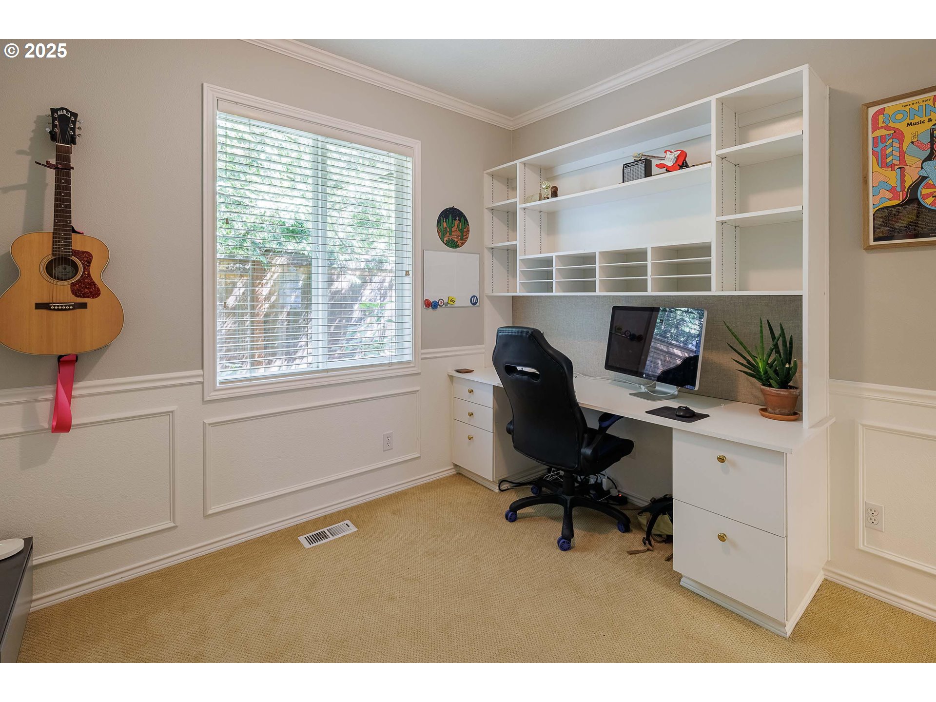 6424 Southwest Flower Street Portland, OR 97221 - Photo 24 of 29 a view of a workspace with furniture and a window