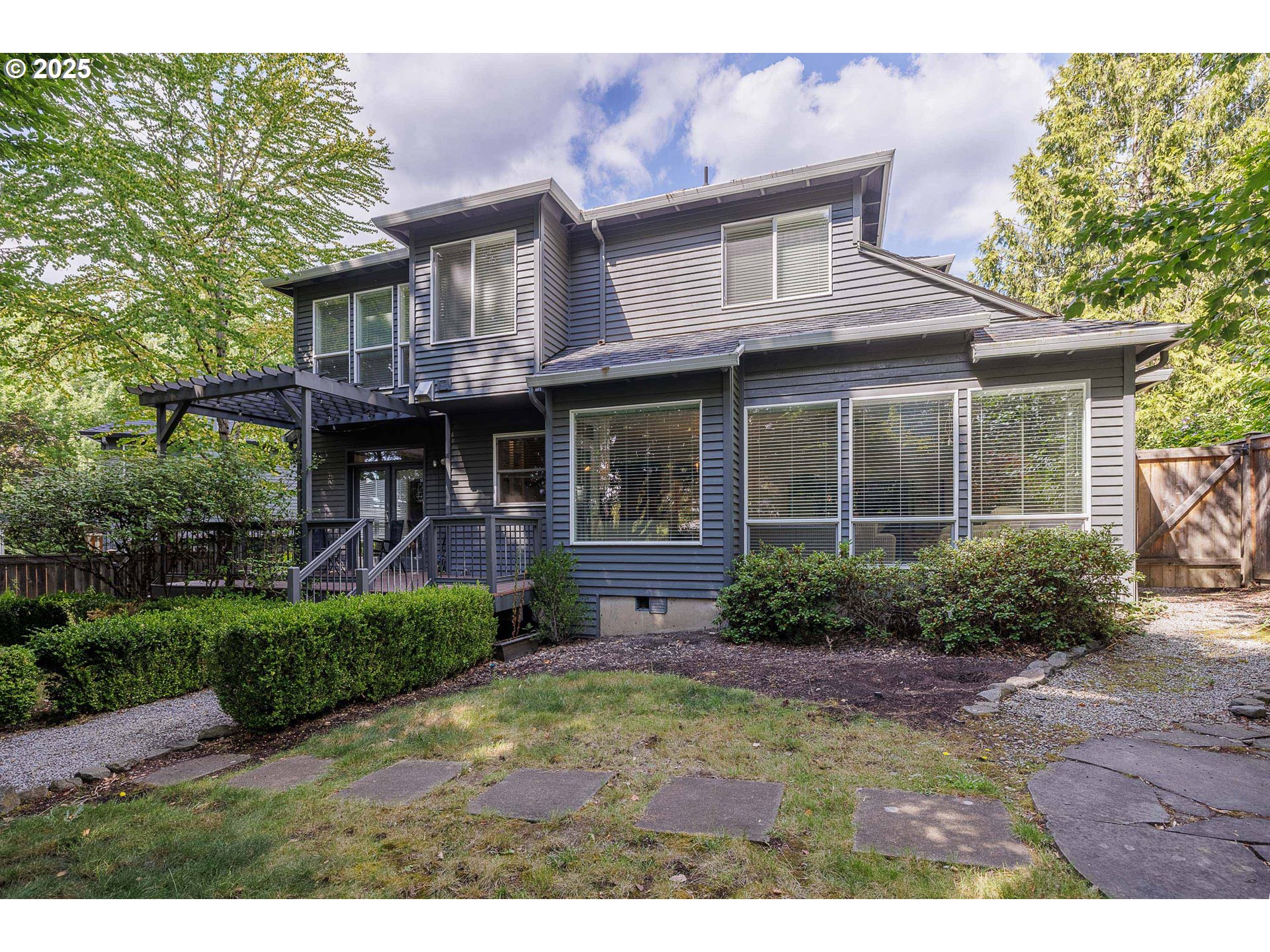 6424 Southwest Flower Street Portland, OR 97221 - Photo 26 of 29 a front view of a house with garden