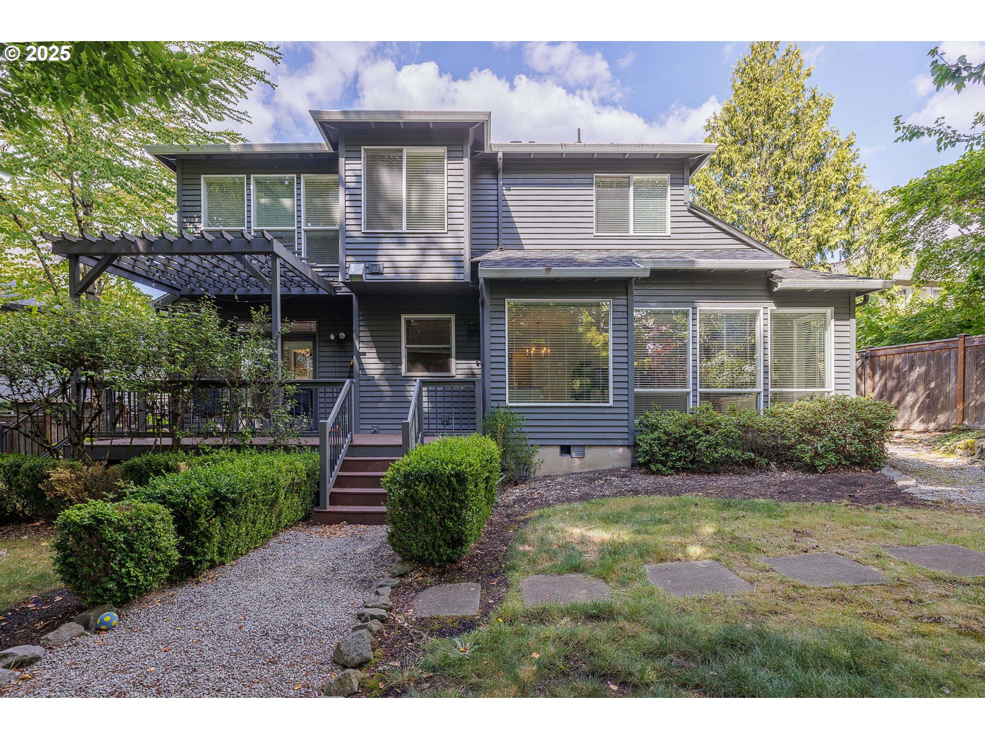 6424 Southwest Flower Street Portland, OR 97221 - Photo 29 of 29 a front view of a house with garden