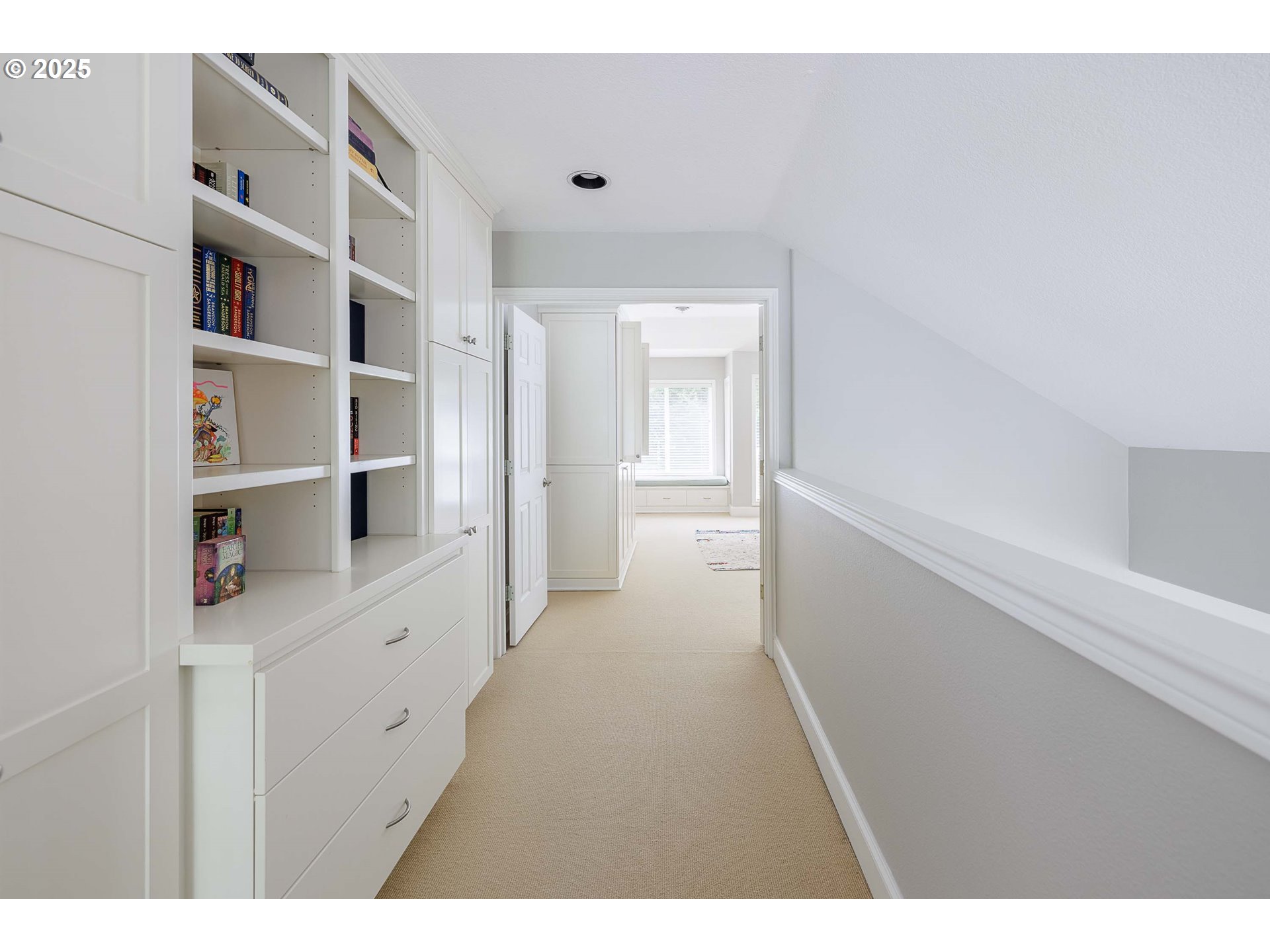 6424 Southwest Flower Street Portland, OR 97221 - Photo 10 of 29 a hallway with cabinets