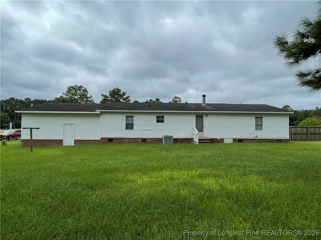 5922 Shiloah Church Road Fayetteville, NC 28306 - Photo 21 of 23 a view of a yard with an outdoor space