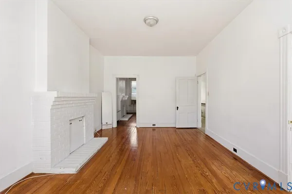 a kitchen with stainless steel appliances granite countertop wooden cabinets a sink and dishwasher
