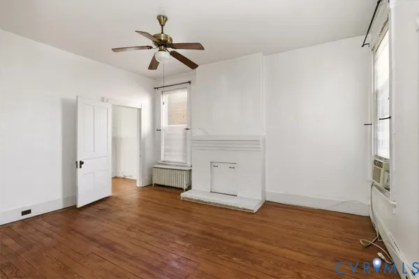 a view of a balcony with wooden floor