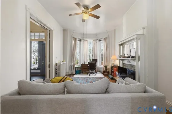 a kitchen with cabinets and window