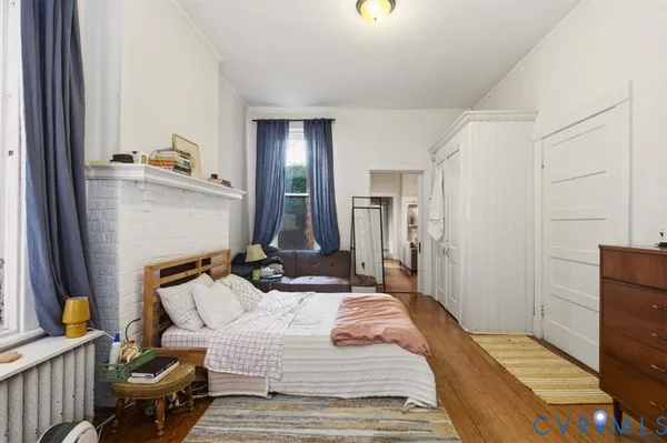 a kitchen with granite countertop a cabinets and steel appliances