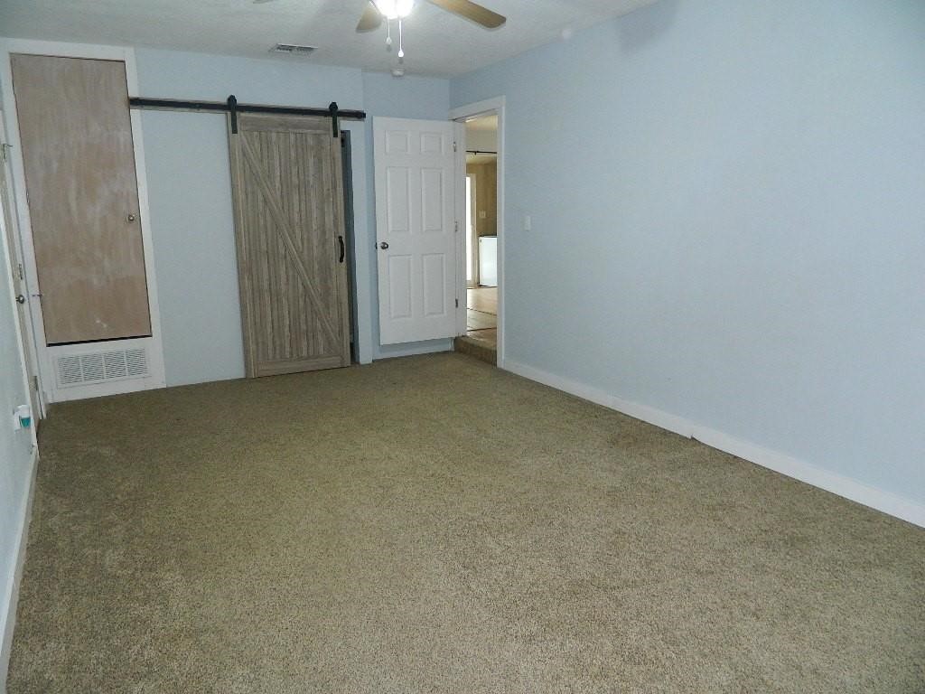 101 Maple Drive Portland, TX 78374 - Photo 9 of 11 an empty room with closet area