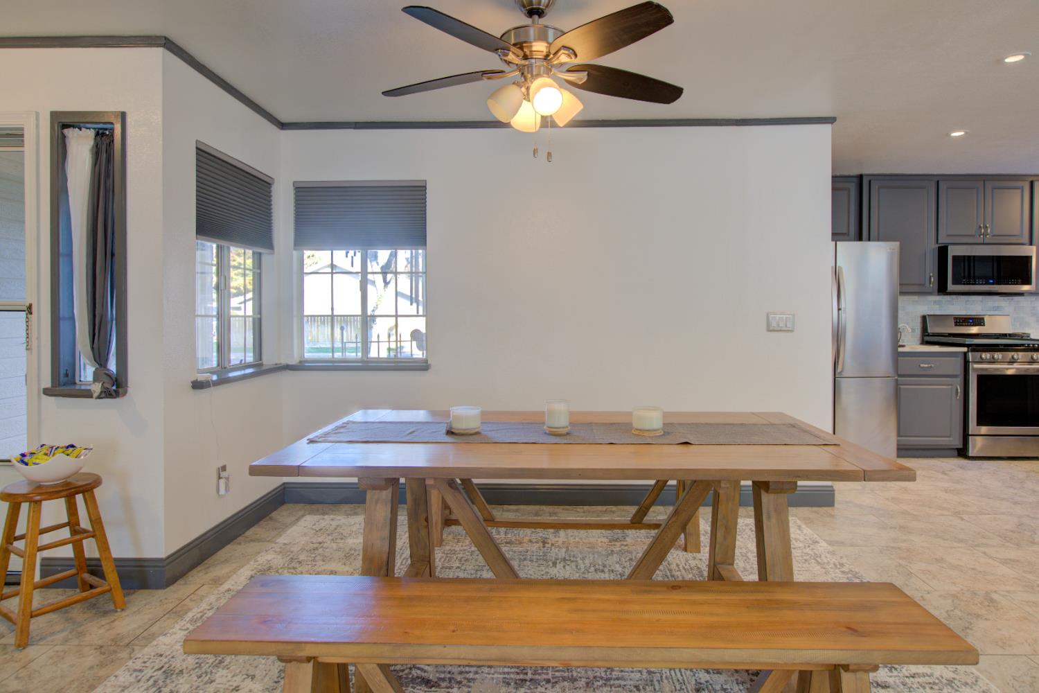 604 Kinshire Way Patterson, CA 95363 - Photo 11 of 42 a room with furniture and a table