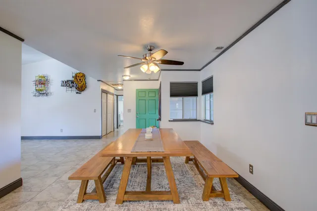 a kitchen with stainless steel appliances granite countertop a stove sink and cabinets